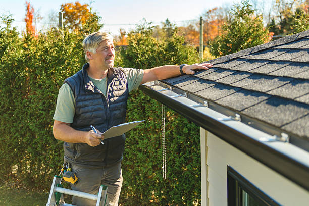 Professional Roofing technician working in Hartly, DE